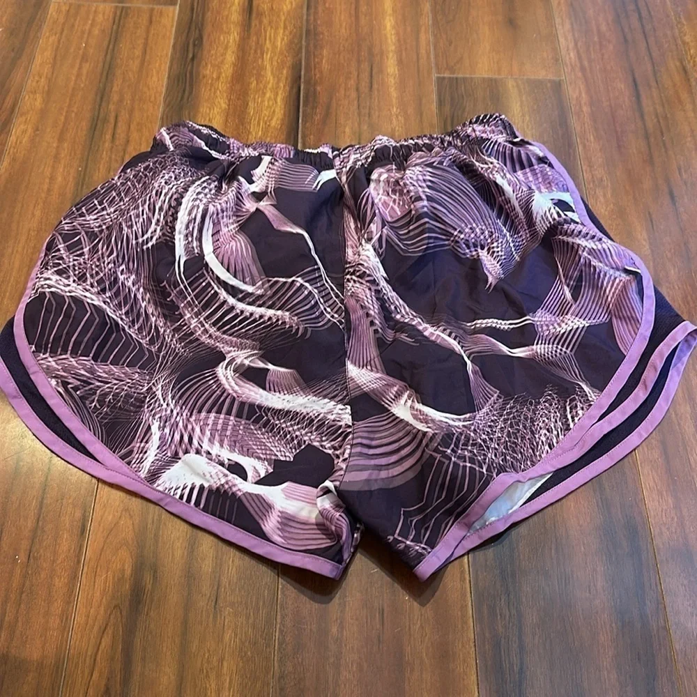 NIKE DRI FIT PURPLE AND WHITE DESIGN ATHLETIC SHORTS